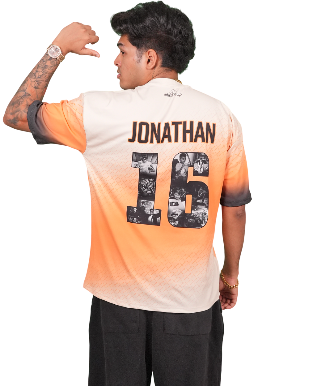 Jonathan pointing at the number 16 on the back of his jersey